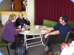 Jeanette Beamish, Val Alison and Peter Littlejohn deep in conversation over lunch.