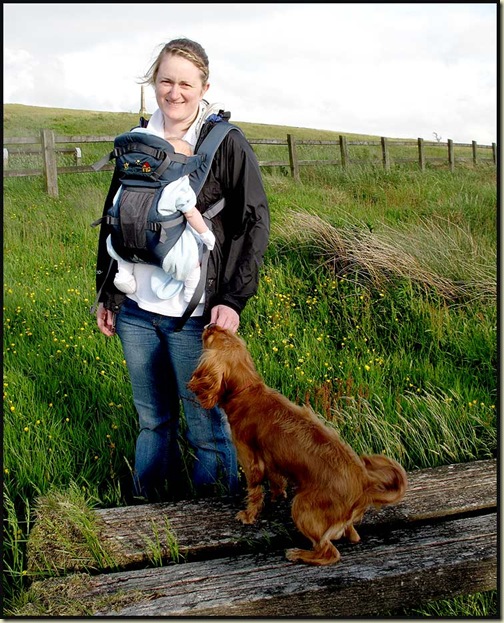 Mum, baby, and dog, all enjoying the freedom offered by the Vaude Soft 111 Baby Carrier