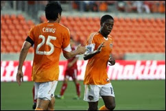 May 29, 2013; Houston, TX, USA; Houston Dynamo forward Brian Ching (25) congratulates midfielder Alex Dixon (19) after scoring a goal during the first half against FC Tuscon at BBVA Compass Stadium. Mandatory Credit: Troy Taormina-USA TODAY Sports