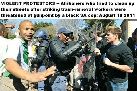 Afrikaners who tried to clean up after striking trash removal workers threatened at gunpoint by black SA cops Aug 18 2011