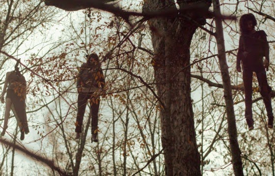 Treehouse still - bodies hanging from trees