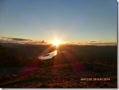 Exactly 12:00 AM 6/28/14 Yukon River reflecting the sun