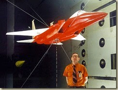 Langley researcher Moses Farmer with F-15 model in preparation1
