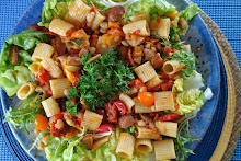 Pasta with Fresh Tomato, Sausage & Peppers, with Navy Beans over Greens