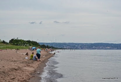 Even with overcast skies, there are people at the beach