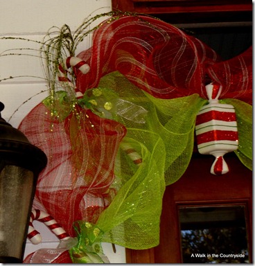 A Walk in the Countryside: Christmas Front Door decorated in candy and mesh ribbon