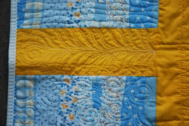 Yellow Improv Quilt Quilting Feather
