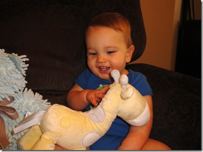 7.  Knox smiling with Giraffe