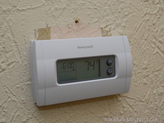 new thermostat! wall needs some touch up paint!