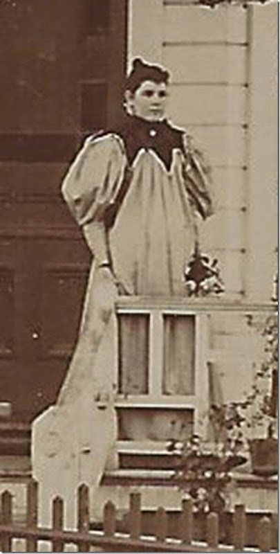 Bertha in front of house c 1895 cropped