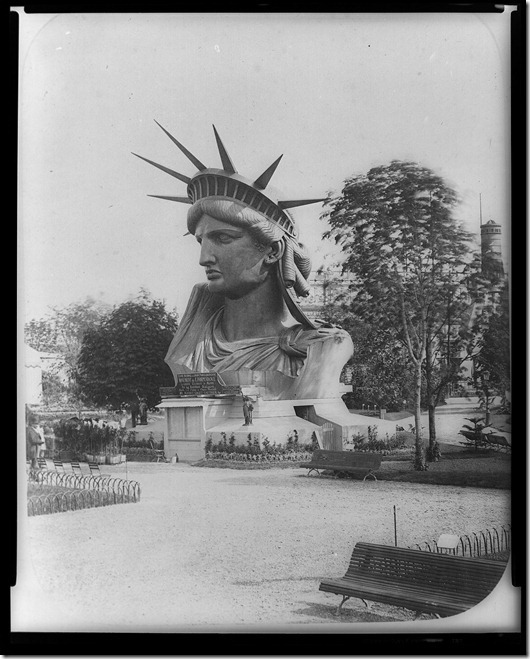 This is a photo showing the head of the Statue of Liberty on display in France early in 1884 prior to being shipped to the United States. (Photo from the Library of Congress)