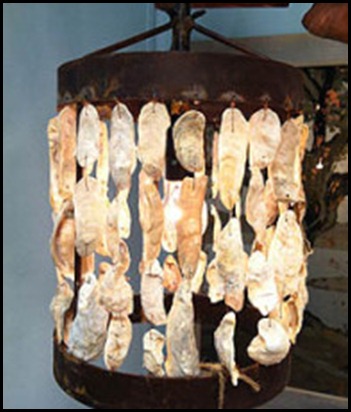 05-15-33_low-countrys-oyster-shell-hanging-drum-lantern_420