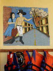 Painting in a Panamanian firehall depicting the truth about firemen.