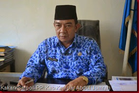 Kakan Satpol-PP Bangkinang Kab.Kampar Abdul Jumrah,Saat di jumpai diruang kerjanya Senin (22-12-2014)
