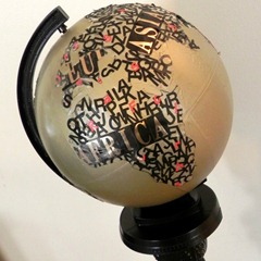typographical art globe with upcycled pedestal square