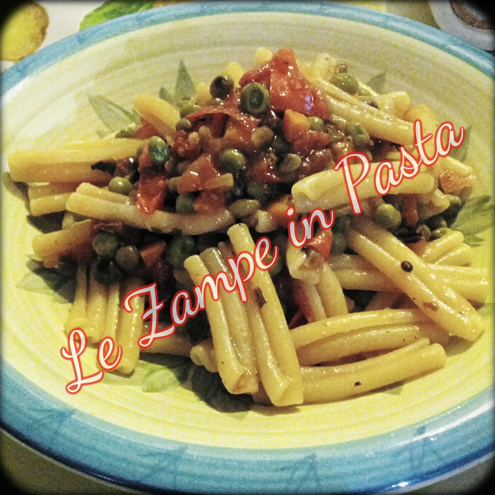 Le Zampe in pasta Pasta piselli e pomodoro