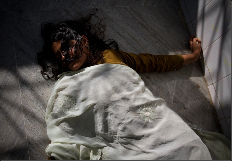 A Woman Exhausted After Her Exorcism-Dadi Amma ki Chakki- Photo © Tewfic El-Sawy-All Rights Reserved