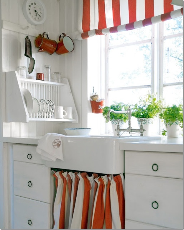 White kitchen with splash of red-love the stripe window swag and sink skirt -design addict mom
