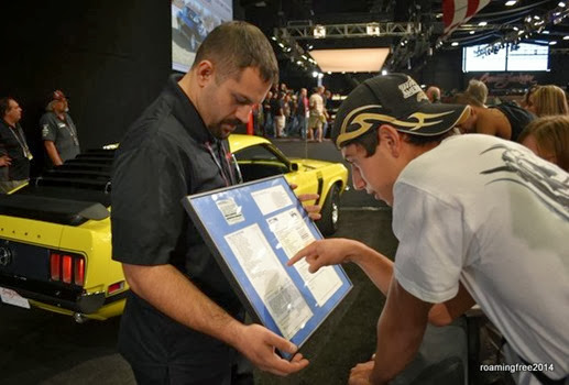 Nicolas studies the specs on the Boss 302