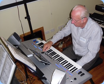 Rob Powell setting-up the Tyros 4 to play
