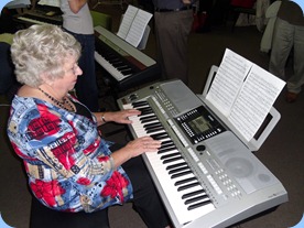 Barbara Powell giving Peter Brophy's Yamaha PSR-910 a work-out