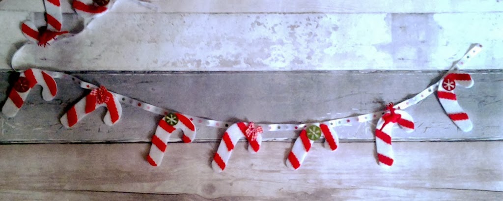 [DIY-candy-canes-sewn-on-to-ribbon5.jpg]
