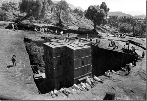 Bet Giorges - a unique rock-hewn church with groundfloor of Greek Cross -  was caved  between 1137 and 1221. A church of thirteen meters  in monolithic stone of volcanic rock called tufa.  King Lalibela after his visitation to Holy Land wanted to build a new holy city substitute of Jerusalem and  had the inestimable knowledge of Christian Egypt  whom escaped from Islamic invasion.
The whole 13 Th rock-hewn churches of Lalibela are considerate as candidate to 8 Th world wonder.
