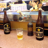 sapporo at convey belt sushi in Roppongi, Japan 