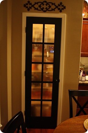 lights in pantry with glass door