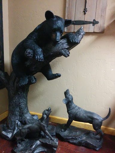 Bear Caught Up In A Tree Sculpture 