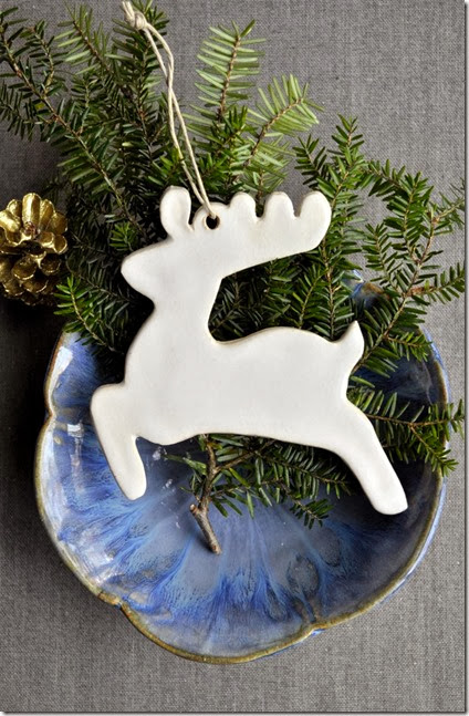 white reindeer ornament in simple display