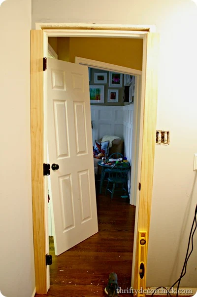 Replace thin door trim with chunky wood