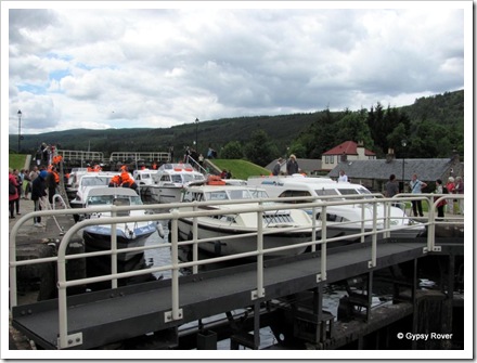Nine cruisers in one lock going down the Caledonian canal flight at Fort Augustus.