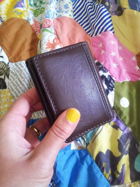 My brown leather wallet bought as a small treat. | 3 things to help you stick to your savings goal.