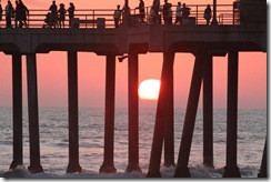 Sunset between pier pilings Ralph Palomares