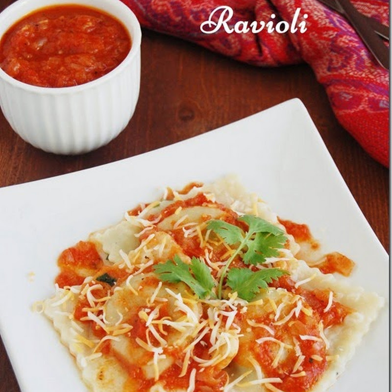 Spinach and paneer ravioli with tomato sauce