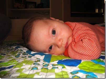 2.  Laying on quilt from aunt lyndsie