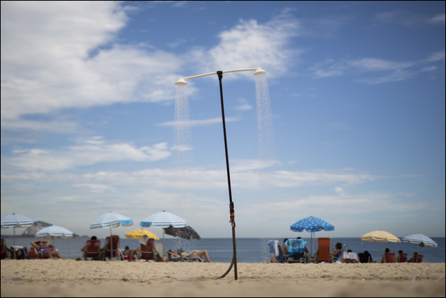 A shower runs continuously on Leblon beach in Rio de Janeiro, Brazil, Wednesday, 11 March 2015. A historic drought making taps run dry across southeastern Brazil, particularly in South America’s largest city of São Paulo, has people worried they might be asked to cut down on their beloved showers. Photo: Felipe Dana / Associated Press