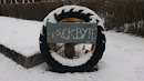Old Tractor Wheel Sign