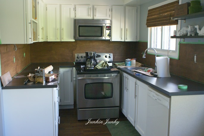 Weathered wood plank backsplash at Junkin Junky