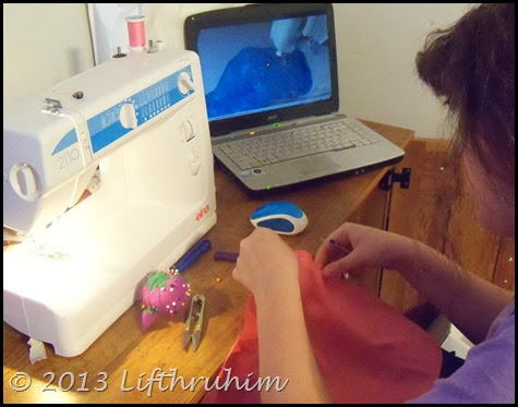 Tailorbear works on sarong using Rosie's Doll Clothes Patterns