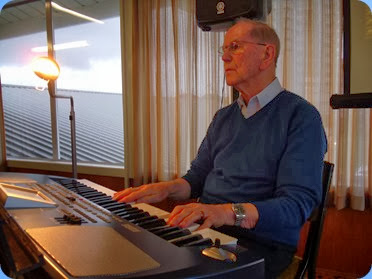John Beales playing the arrival music on his Korg Pa500. Photo courtesy of Delyse Whorwood.