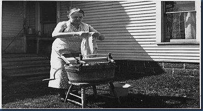 REA_woman_works_washboard REA_woman_works_washboard