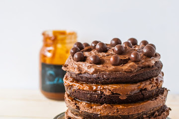 Flourless Brownie Cake with Chocolate Malt Frosting and Caramel