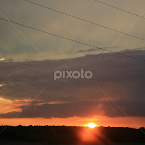 Car capture of glorious sunset by Dianne Collins - Landscapes Sunsets & Sunrises