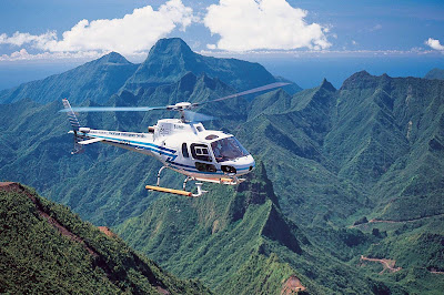 Helicopter tours over Tahiti allow visitors to view the scenic landscapes from a bird's eye view.