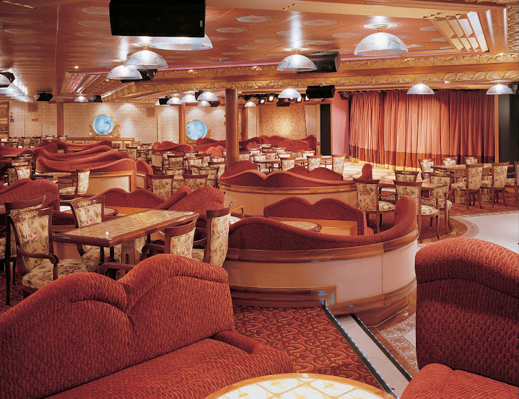 Plan an evening of live music, karaoke and late-night comedy shows at Carnival Liberty's Victoria Lounge.
