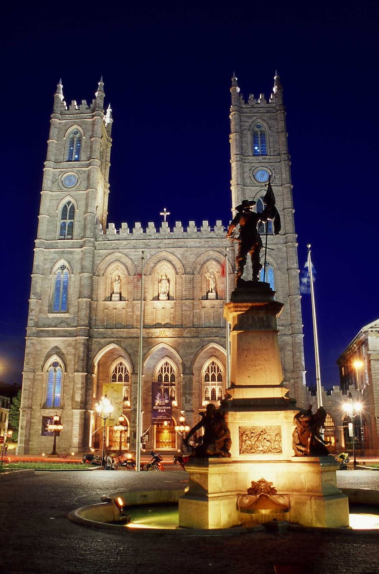 An evening view of Notre-Dame Basilica in Montreal. 