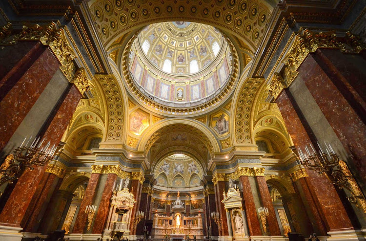 Inside ornate St. Stephen's Basilica in Budapest, Hungary. See it on a river cruise down the Danube.  