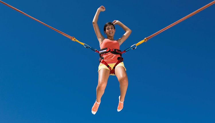 For exhilarating fun, teens, children and adults can try out a bungee jump trampoline at Enchantment of the Seas' Jump Zone.